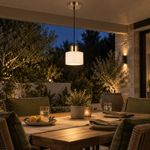 Sophia White Marble Pendant Light — PROMPT 4 — Outdoor covered patio dining with evening ON glow