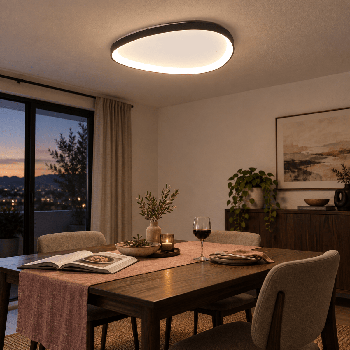 Isabella Large Ovoid Black LED Ceiling Light — PROMPT 1 — Dining room flush focal light, evening table moment