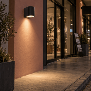 Sophia Aluminum Outdoor Wall Light — PROMPT 2 — Retail walkway facade accent, signage night calm