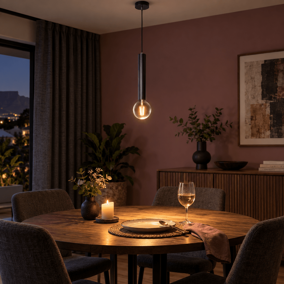 Black Flute Pendant Light Thomas — PROMPT 4 — Evening dining with pendant highlighted in a muted lounge