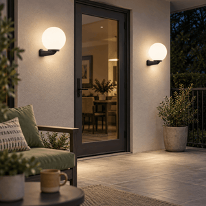 Olivia Outdoor Wall Light lifestyle scene: Pair along a covered patio seating wall