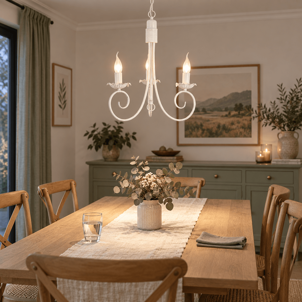 Aurora 3-Light Fossil White Chandelier lifestyle scene: Dining-room chandelier over a used table