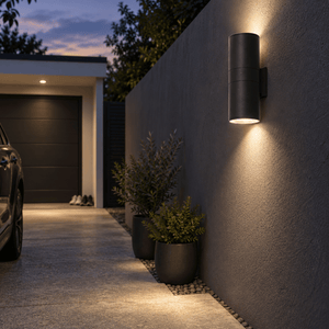 Outdoor Wall Light Ayelen - Up & Down lifestyle scene: Garage drive edge along boundary wall