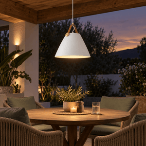 White leather & Iron Pendant Light Ayelen lifestyle scene: Coastal patio dining table with covered overhang pendant