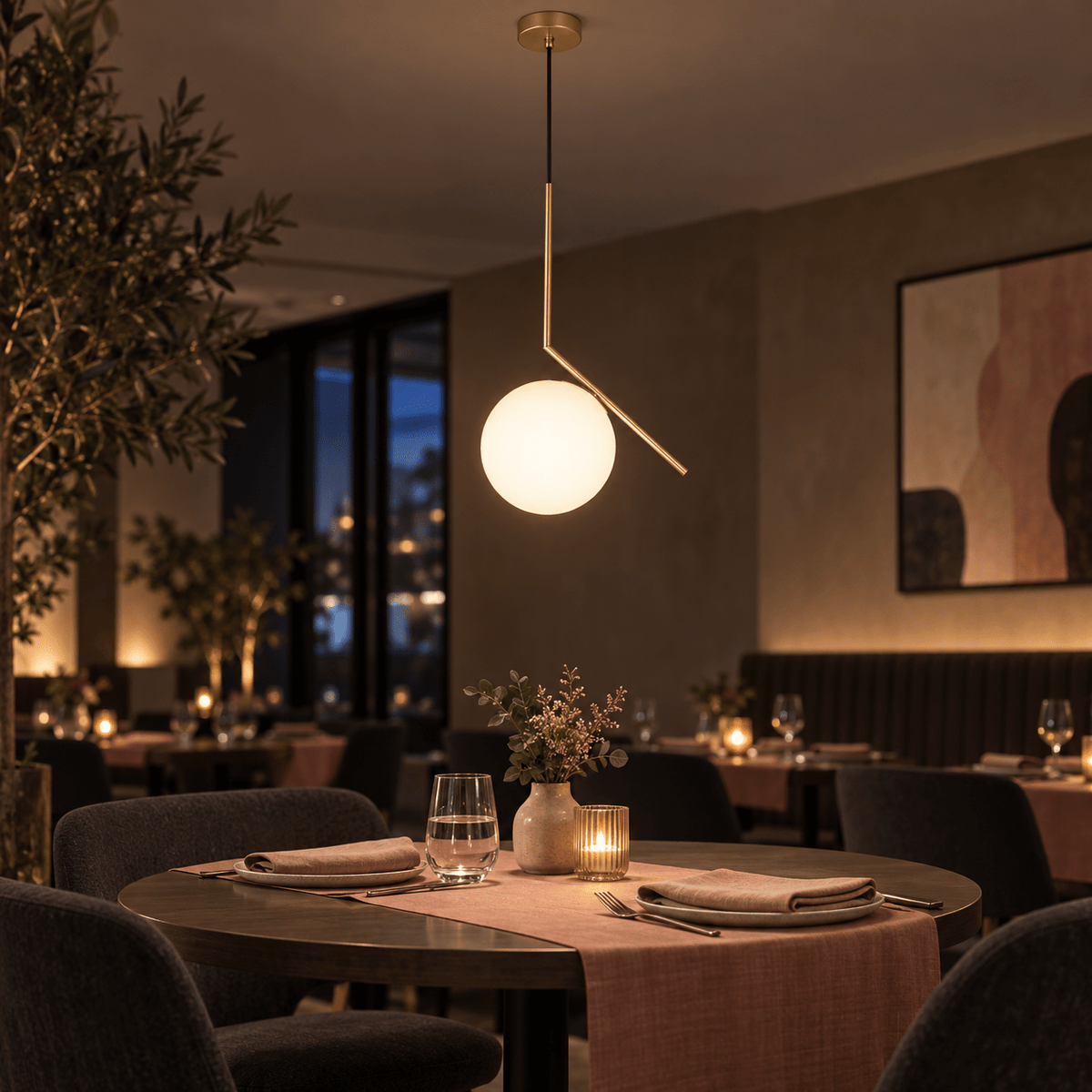 Pendant Light - Satin Gold with Opal White Glass lifestyle scene: Restaurant table moment with muted clay tones