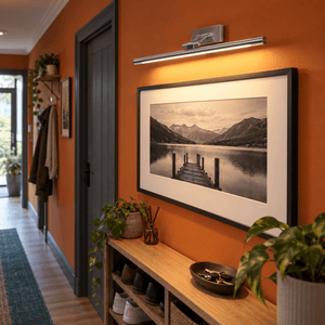 Asha Satin Picture Light 8W LED - Warm White lifestyle scene: Hallway statement photograph, narrow vertical light highlight