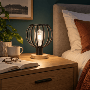 Beatriz Light Wood Table Lamp Metal Finish Minimalist Design lifestyle scene: Nightstand reading in a deep teal bedroom
