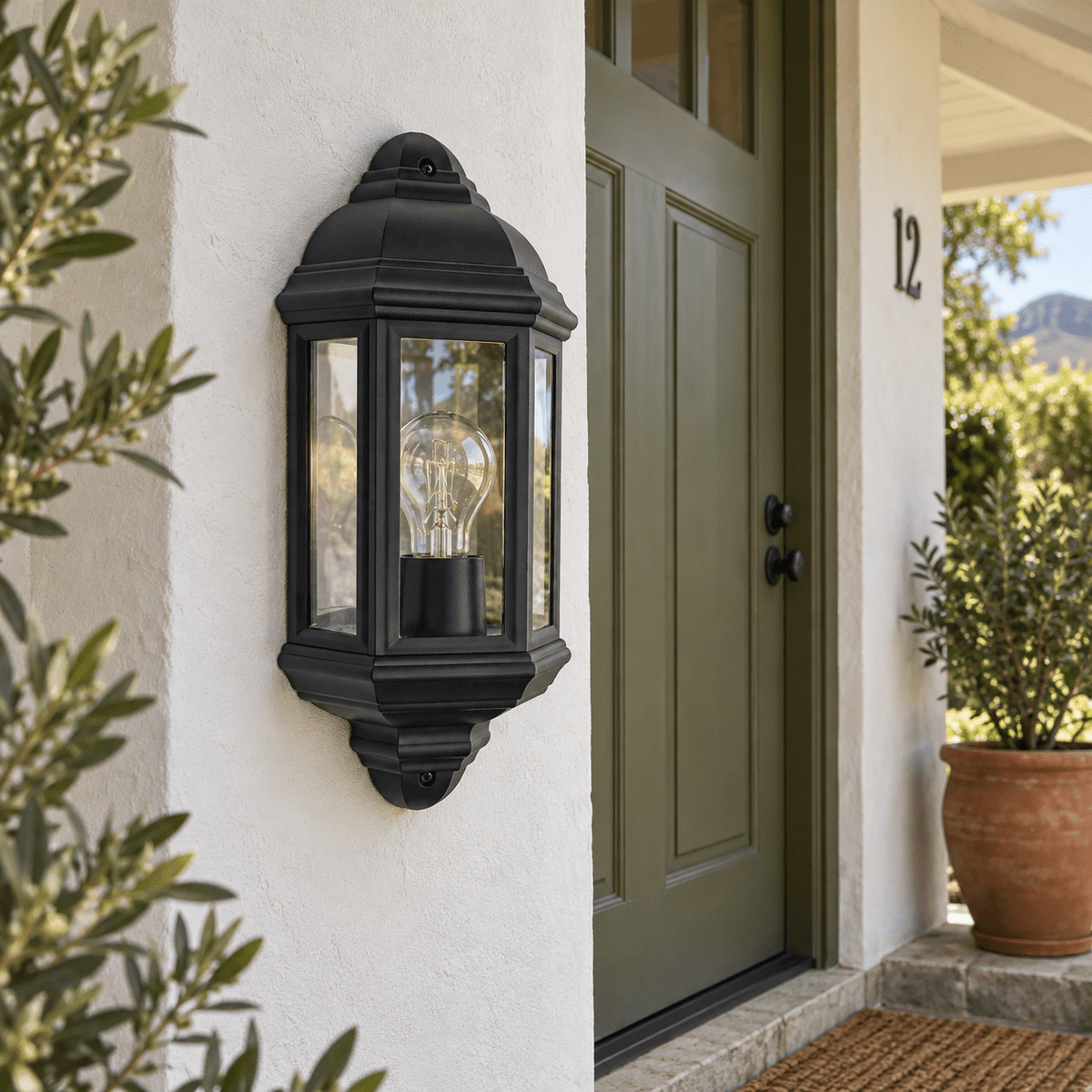 Coastal Black Outdoor Wall Light Polypropylene IP44 — covered front stoep in daylight