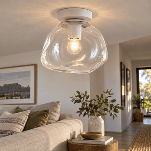Small Glass Molten Ceiling Light – Clear Glass and White — in a lounge