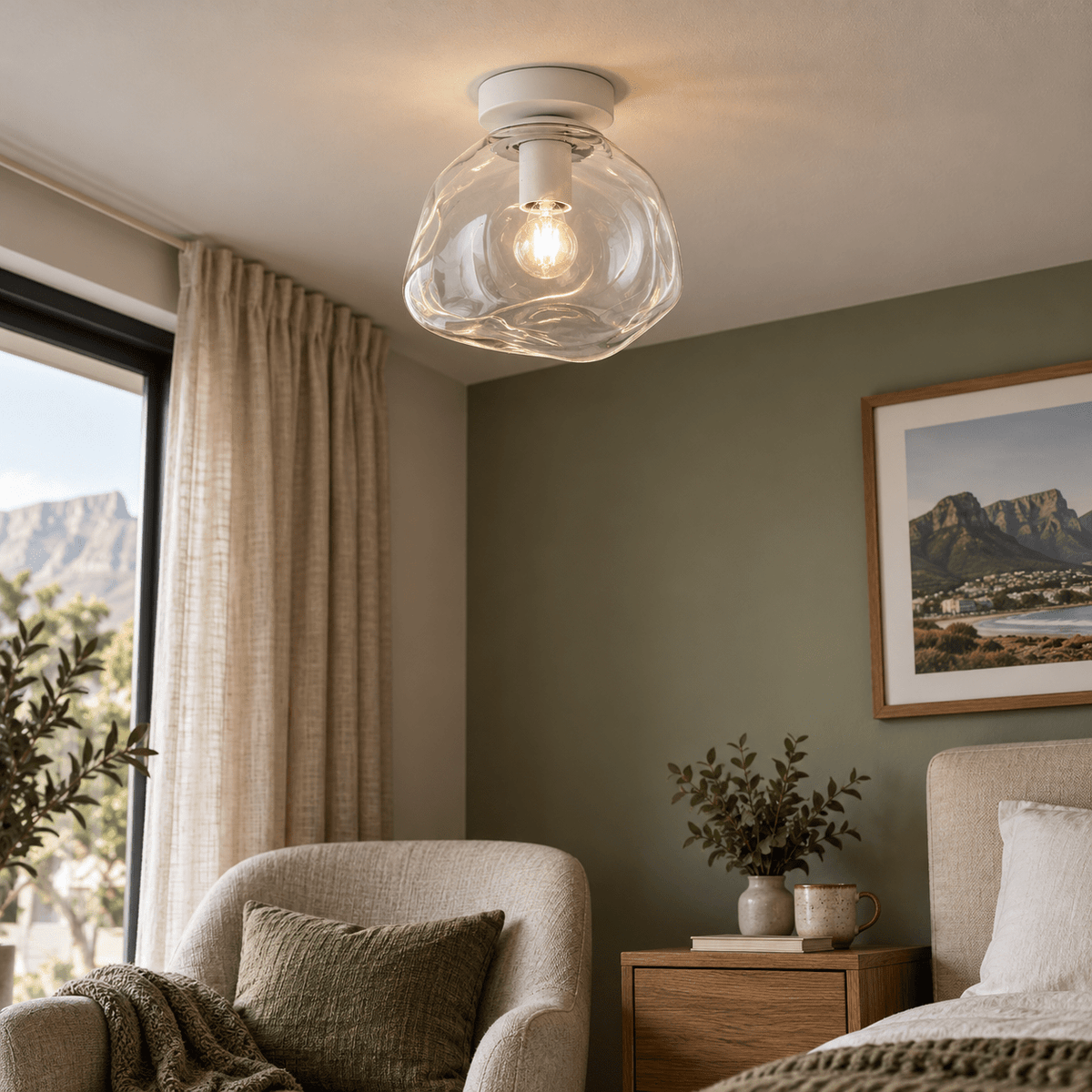 Small Glass Molten Ceiling Light – Clear Glass and White — above a bedroom reading nook