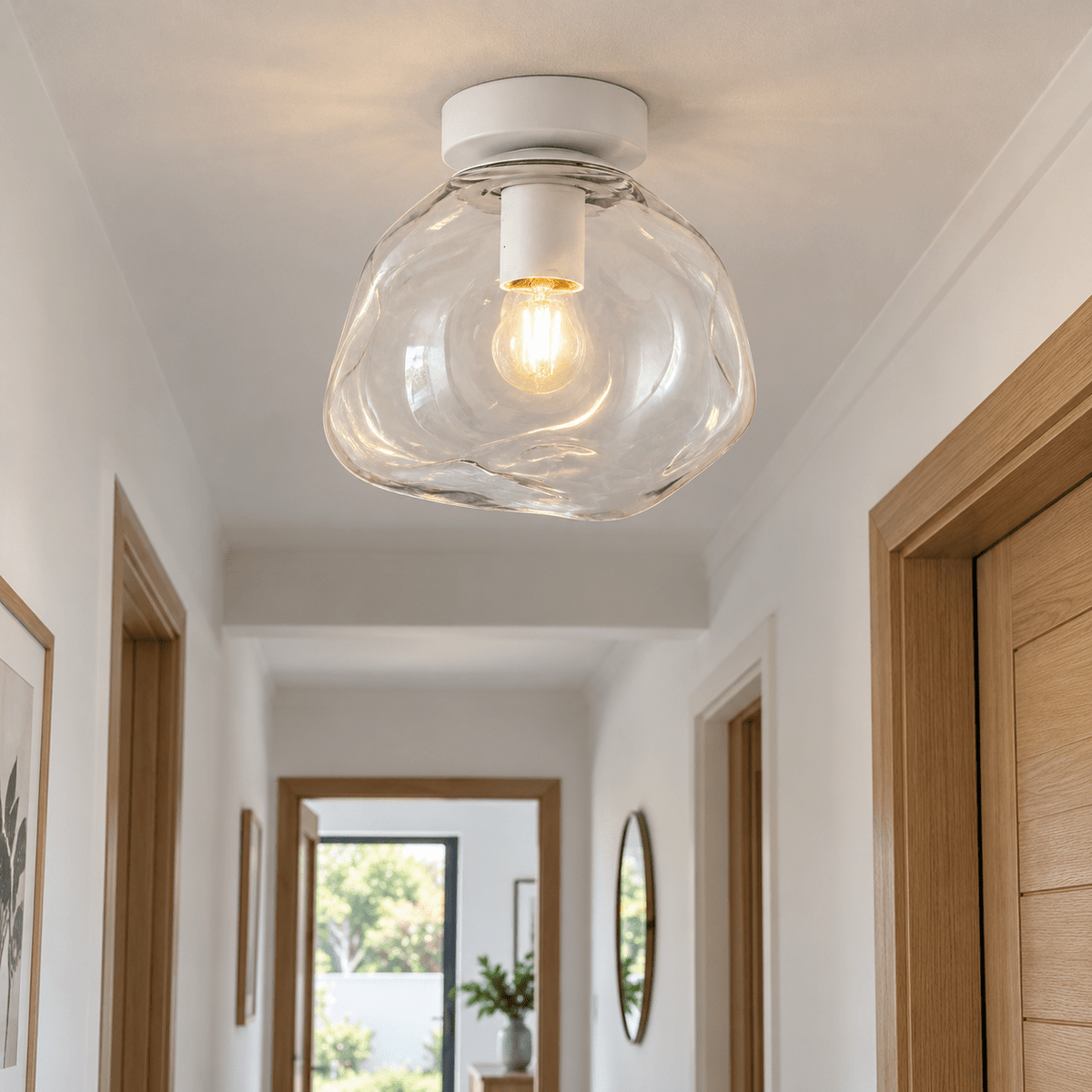 Small Glass Molten Ceiling Light – Clear Glass and White — in a daylight hallway