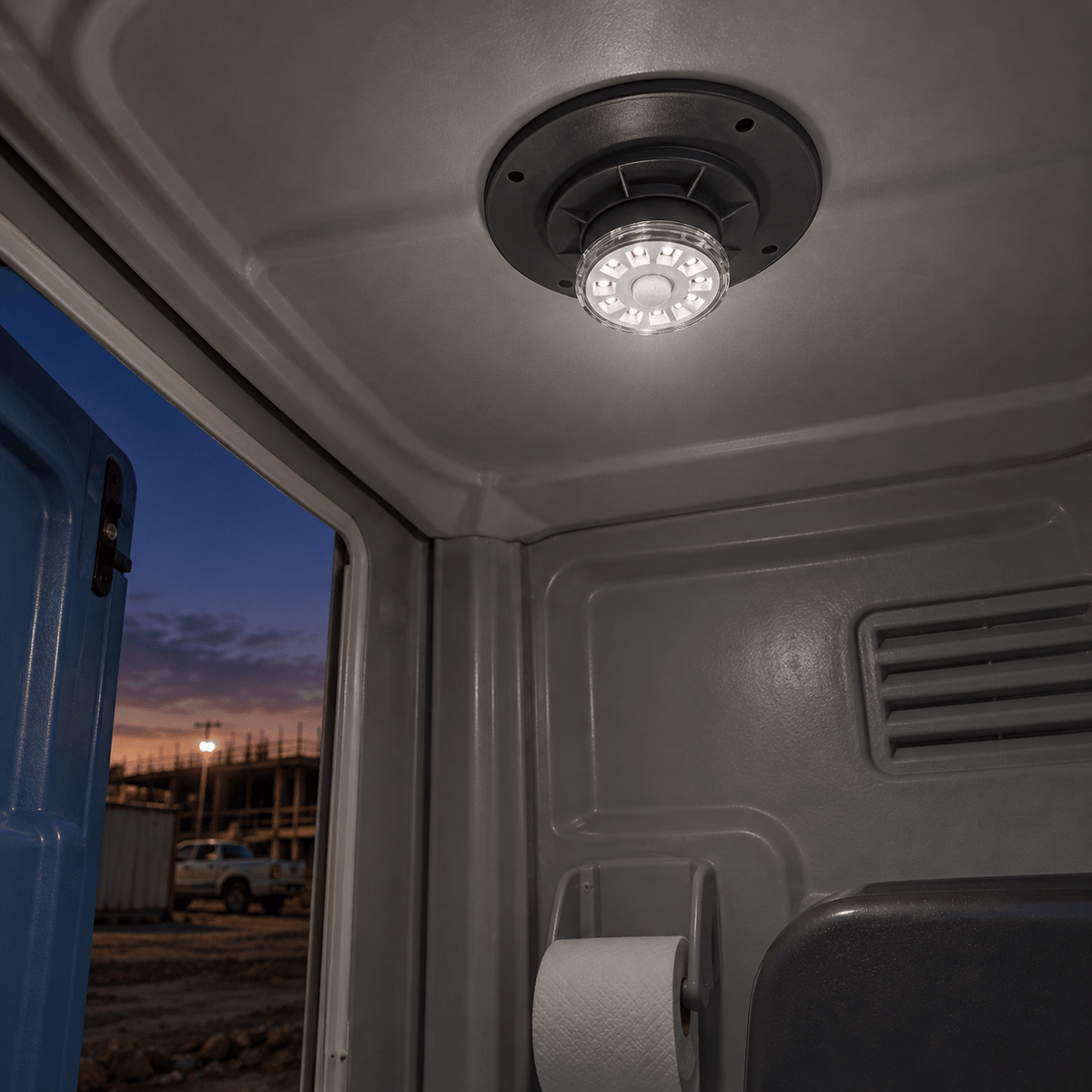 Eco-friendly Solar Powered Motion Sensor Loo Light - 45 — inside a portable toilet at dusk