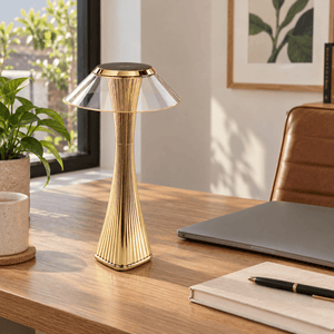 Golden Pixie Gold LED Table Lamp - Rechargeable Portable — on a home-office desk in daylight