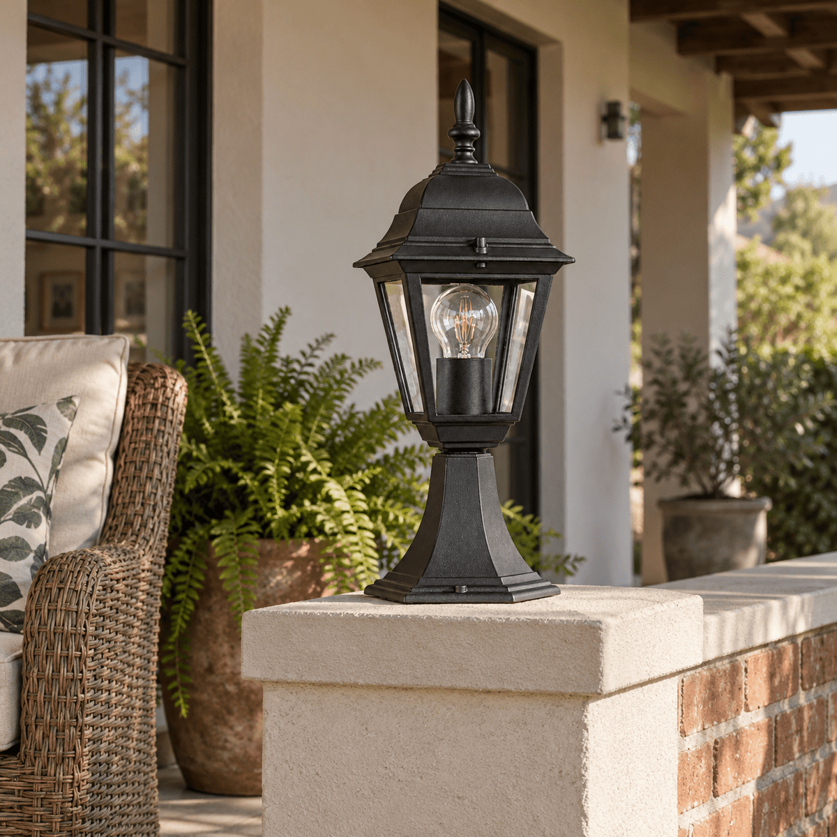 Black Outdoor Pillar Light IP33 — installed beside a covered veranda