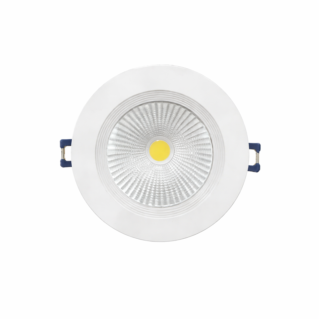 White recessed ceiling light with a yellow center on a white background