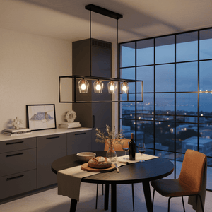 Modern dining room with a round table, chairs, and a large window view.