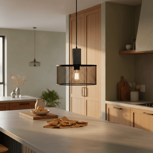 Industrial-style pendant light with mesh shade and stone accent, illuminating a kitchen island.
