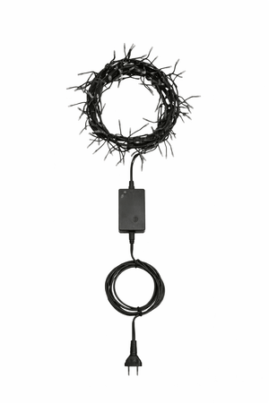 Black wreath light with plug on a white background