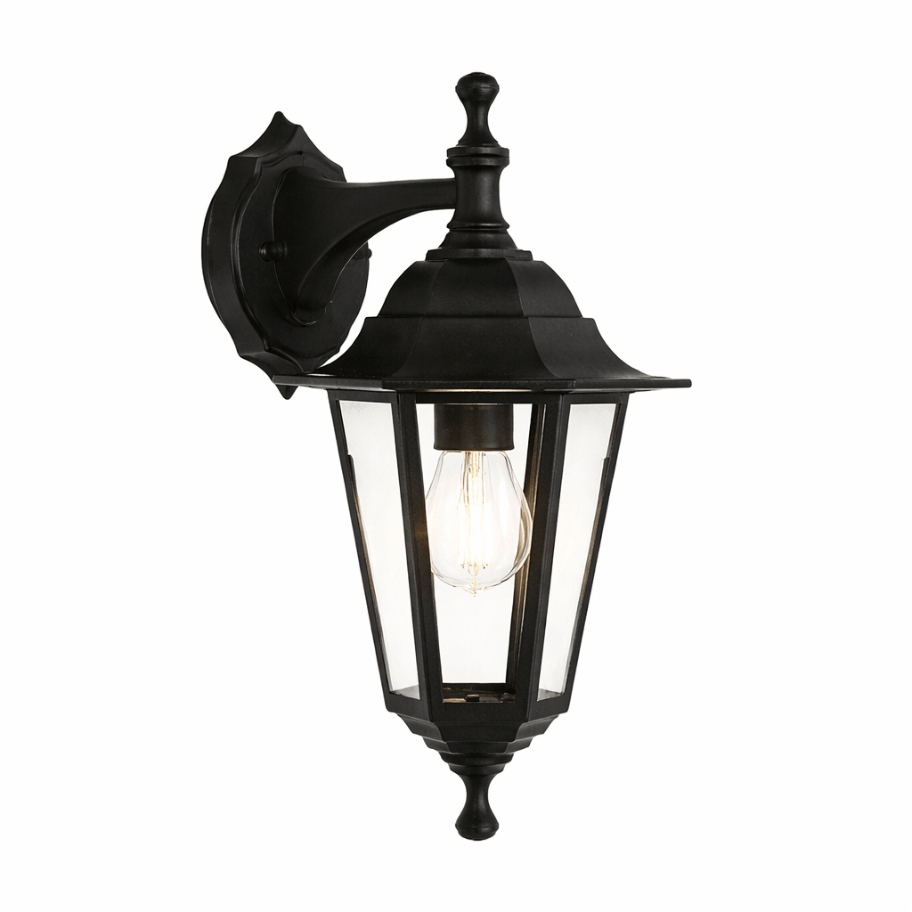 Black outdoor wall light fixture with clear glass shade on a white background