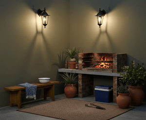 Black outdoor wall light illuminating a cozy patio with a fireplace, plants, and seating.