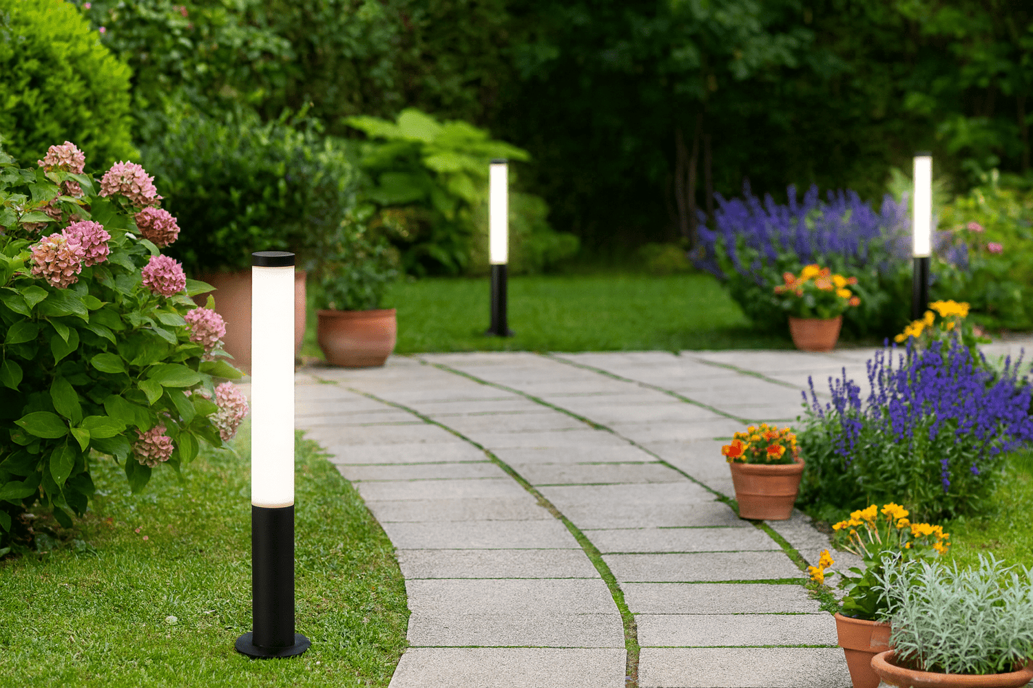 Well-zoned Joburg garden with warm layered lighting accents