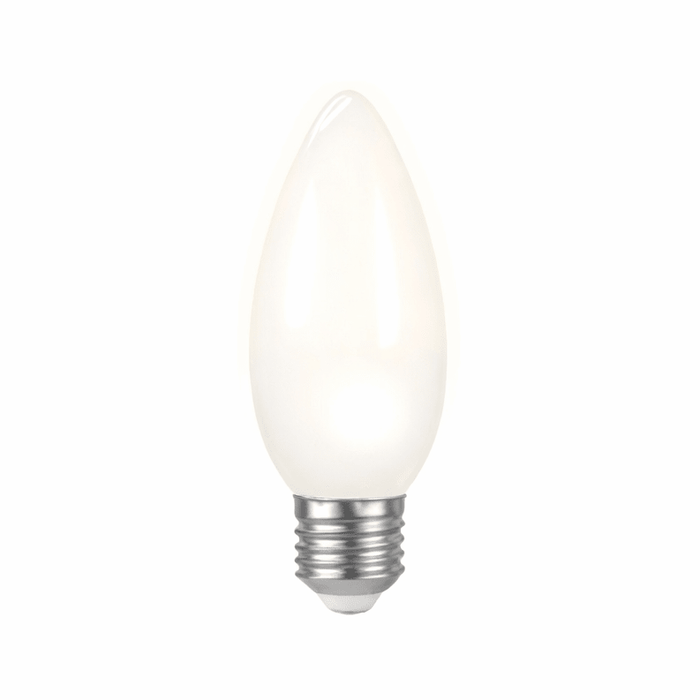 Comparison of clear and frosted LED candle bulbs in a Johannesburg dining room chandelier showing sparkle versus soft diffusion