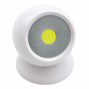 White light sensor with a yellow center on a white background