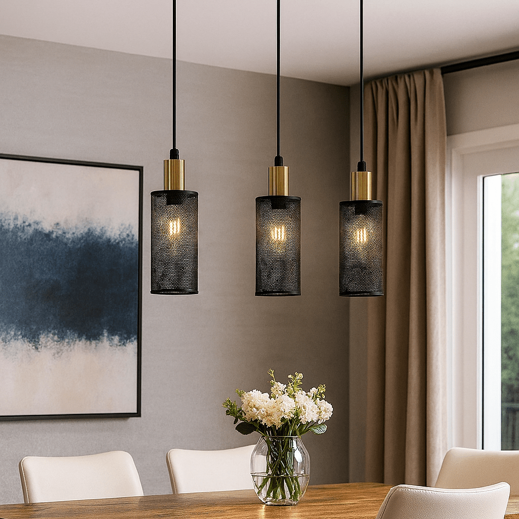 Modern dining room with pendant lights, wooden table, and floral arrangement.