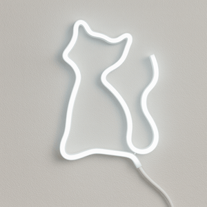Cool White LED Neon Strip shaped like a cat against a textured wall, showcasing flexibility and design.