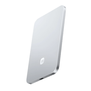 A silver aluminum power bank with a smooth finish, featuring a logo and a USB-C port on one edge.