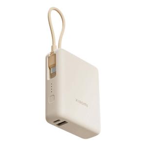 Tan Xiaomi 33W power bank with integrated USB‑C cable loop, showing ports and brand logo