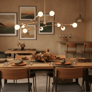 Stylish dining setup featuring a 9-light bronze pendant above a wooden table with decorative elements.