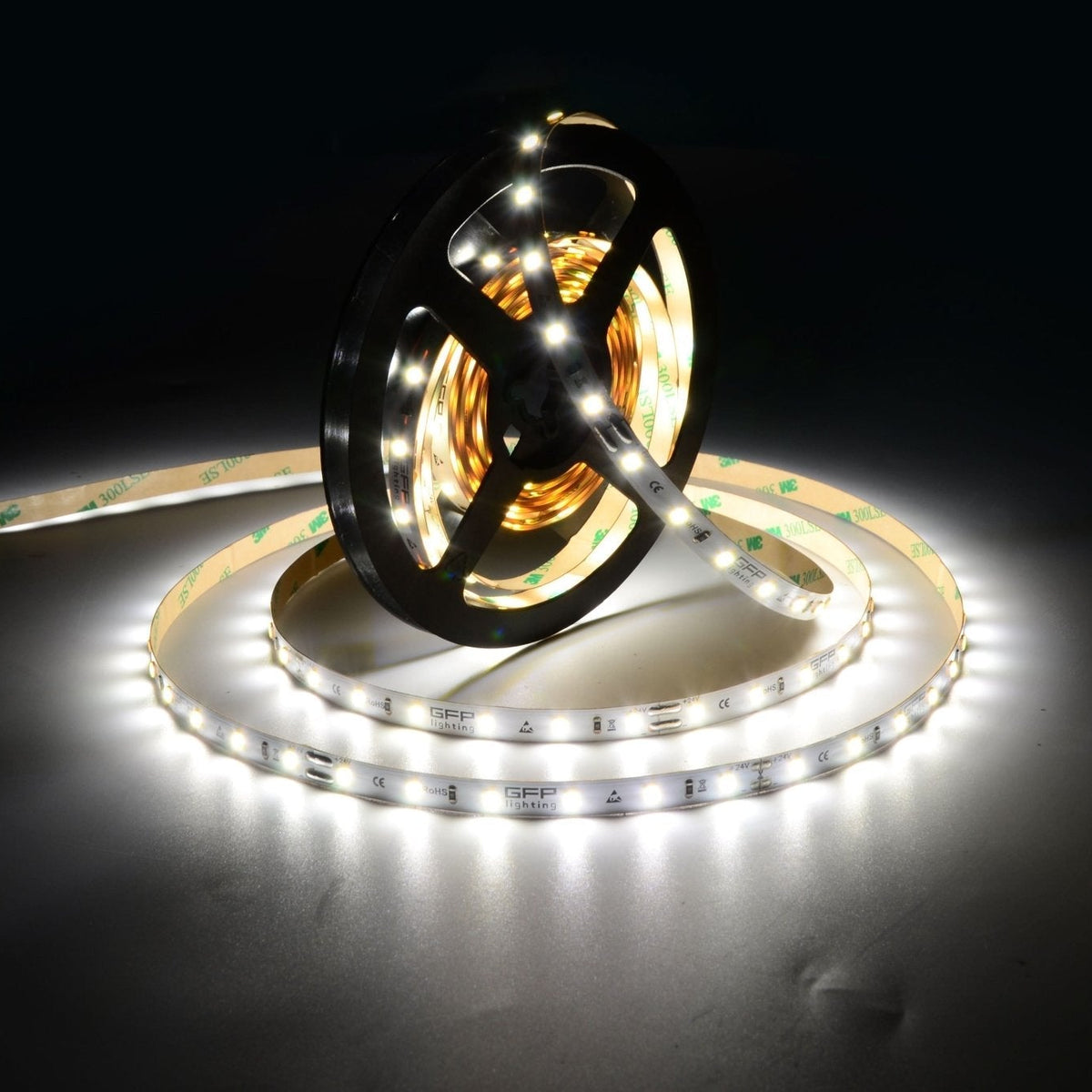 LED strip light roll with warm white illumination, showcasing flexible design and branding.