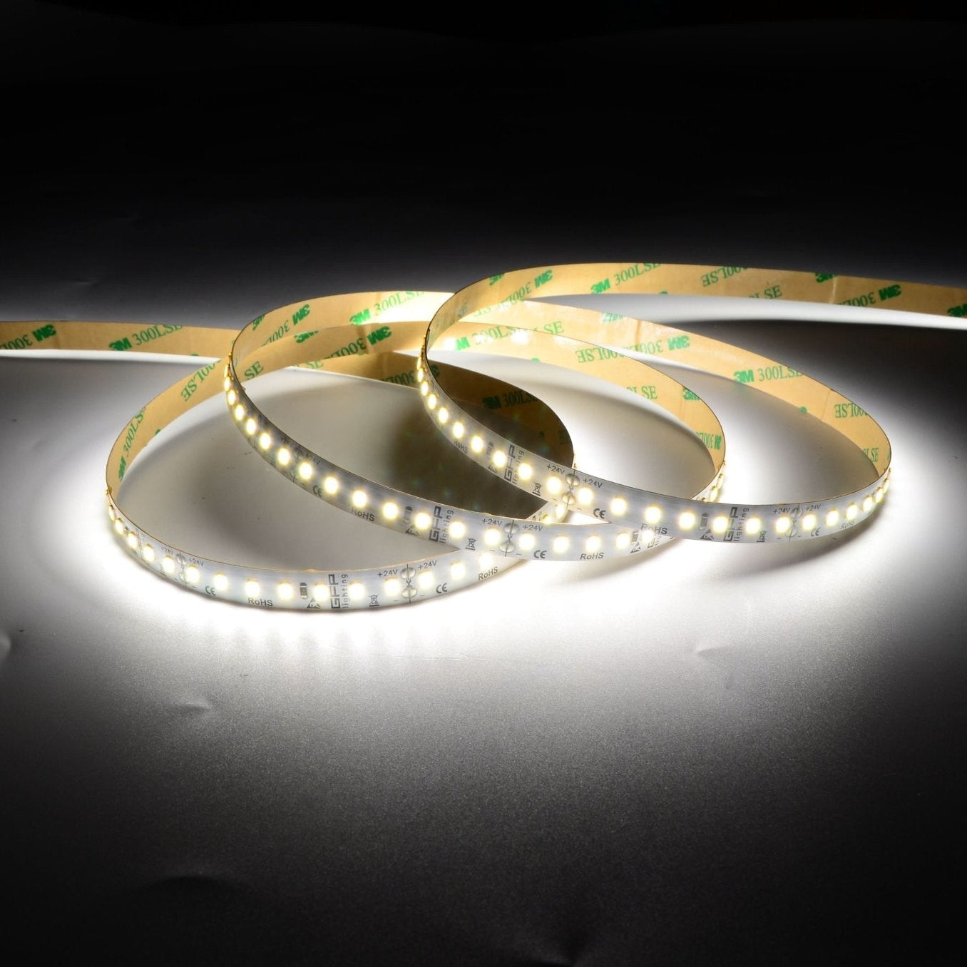 LED strip light rolls showcasing warm white illumination with a flexible design.