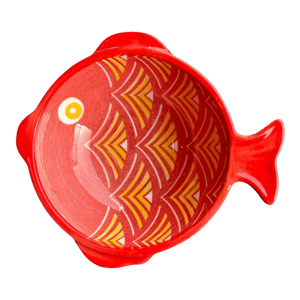 Red ceramic bowl shaped like a fish, featuring orange and yellow scale patterns on the interior.