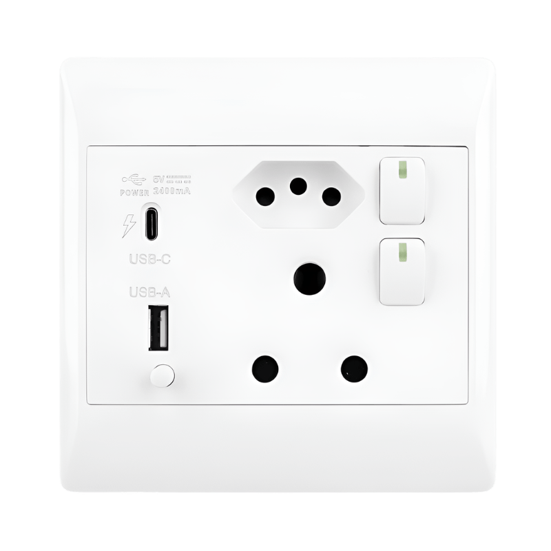 Modern white double USB wall outlet next to a TV unit and sofa in a South African lounge, with charging cables plugged into phones on a coffee table, realistic interior lighting