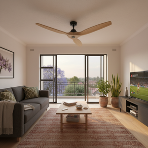 Modern living room featuring a ceiling fan with natural wood blades, stylish decor, and a view outside.