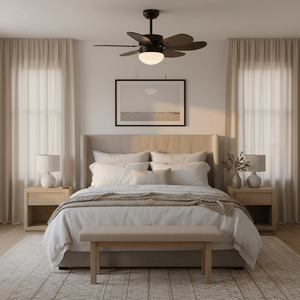 Stylish bedroom featuring a black ceiling fan with six blades and a light fixture above a neatly made bed.