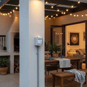 Gray outdoor light fixture with two bulbs on a white background