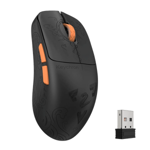 Black gaming mouse with orange accents and intricate designs, accompanied by a USB receiver.