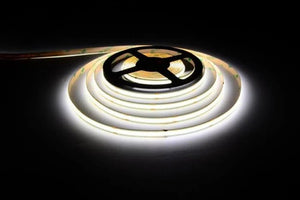 24V 8W COB CRI90 LED strip light emitting Cool White (4000K) light, shown as a flexible strip roll.