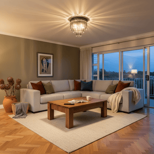 Stylish living room featuring a black flush-mount ceiling light with smokey crystals, illuminating a cozy seating area.