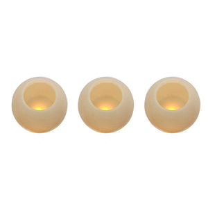 Set of three round LED candles with a warm flickering glow, made of real wax.