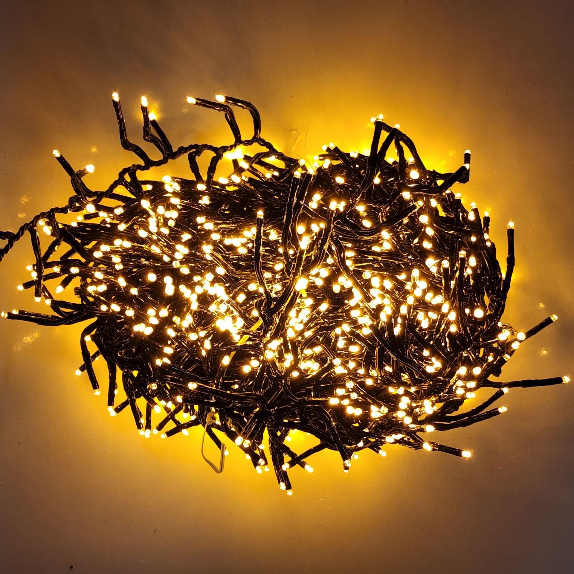 String of lights on a yellow background
