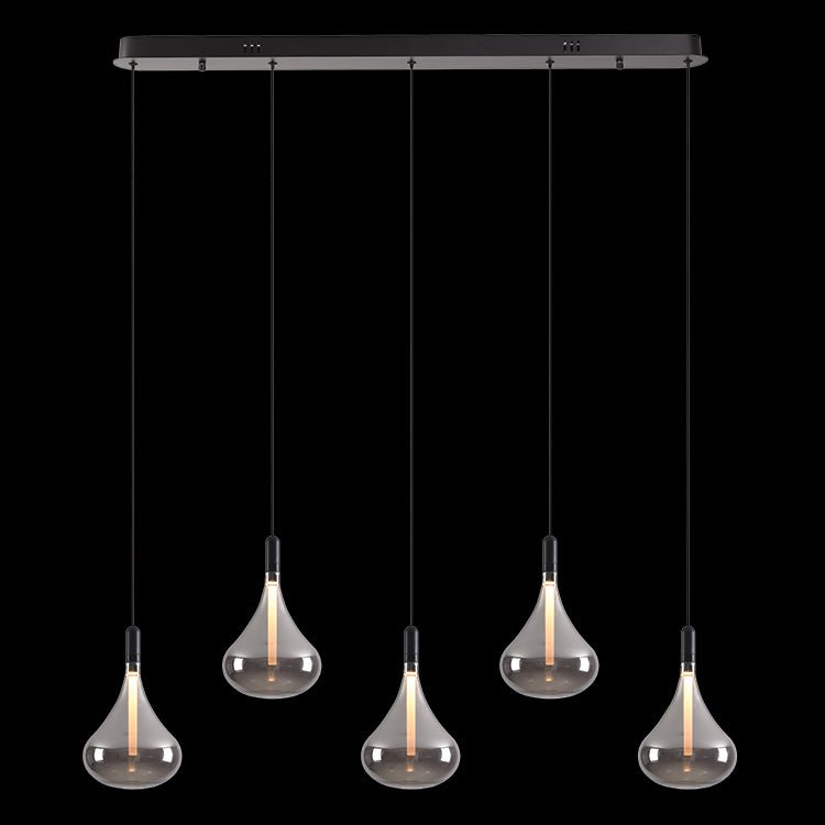 Modern pendant light fixture with five glass bulbs on a black background