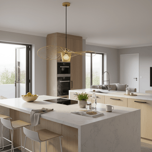 Stylish kitchen featuring the Sensu Large Infinite Gold Pendant Light above a marble island with modern decor.