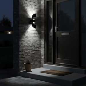Outdoor wall light illuminating a front door area, casting light upwards and downwards on a brick wall.