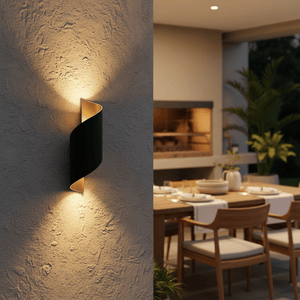 Stylish outdoor wall light casting warm light on textured wall, enhancing patio dining area ambiance.