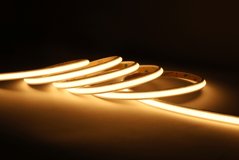 Layered bedroom lighting with ceiling lights and ambient glow