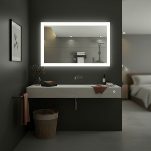 Rectangular LED mirror with touch switch above a modern bathroom sink, featuring towels and decor.